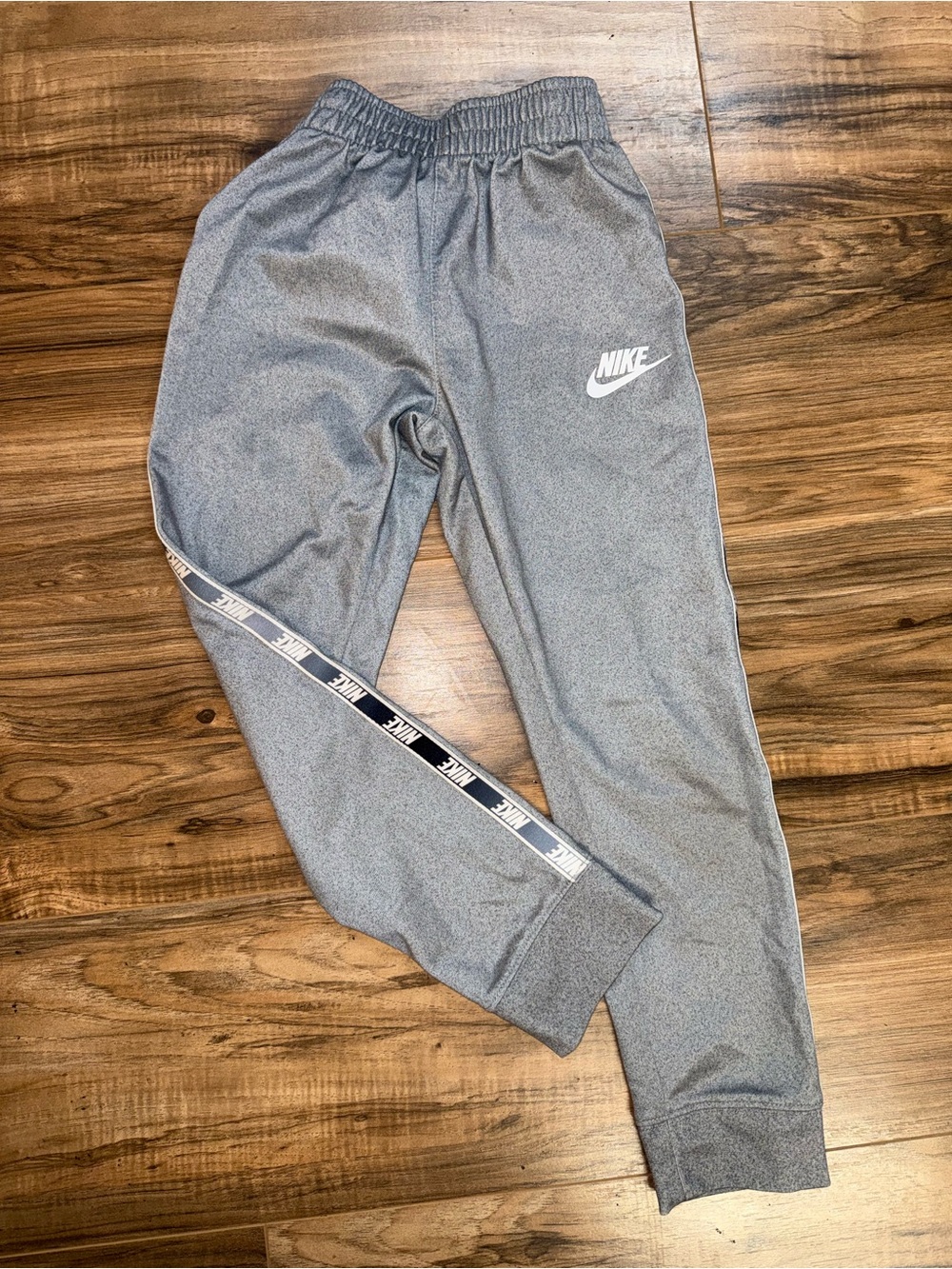 Nike Gray Kids Joggers with White Logo and Side Tape